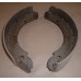 LT230 TRANS BRAKE SHOE PAIR